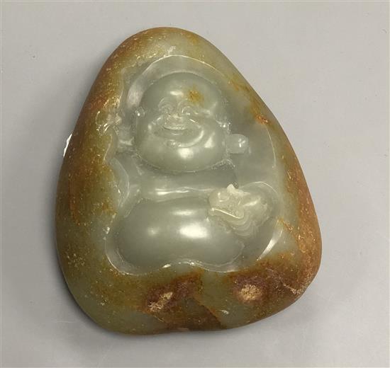 A jade boulder carving of a Buddha